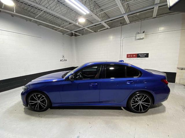Photo of 2022 Portimao Blue Metallic BMW 330
