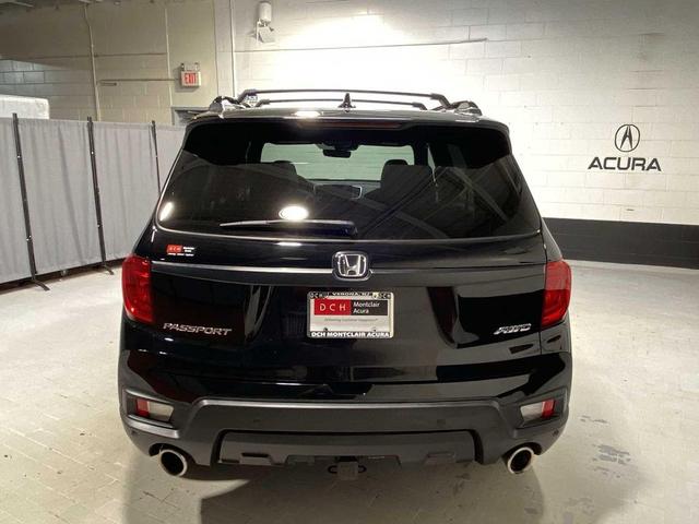 Photo of 2023 Crystal Black Pearl Honda Passport