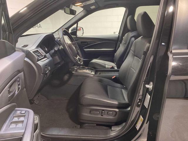 Photo of 2023 Crystal Black Pearl Honda Passport
