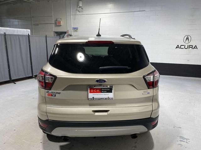 Photo of 2018 White Gold Metallic Ford Escape