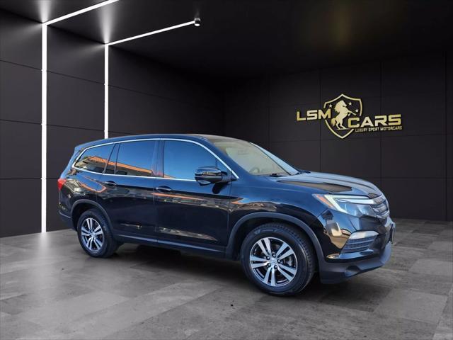 Photo of 2016 Black Honda Pilot