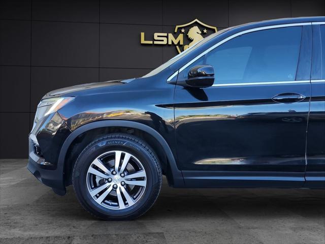 Photo of 2016 Black Honda Pilot
