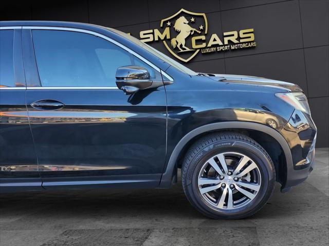 Photo of 2016 Black Honda Pilot