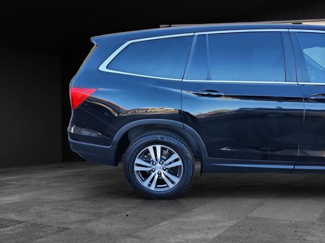 Photo of 2016 Black Honda Pilot