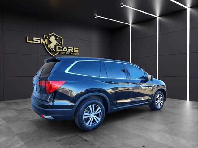 Photo of 2016 Black Honda Pilot