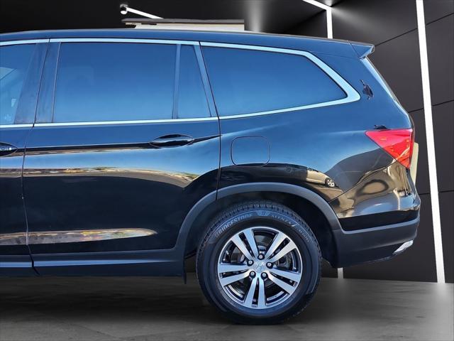 Photo of 2016 Black Honda Pilot