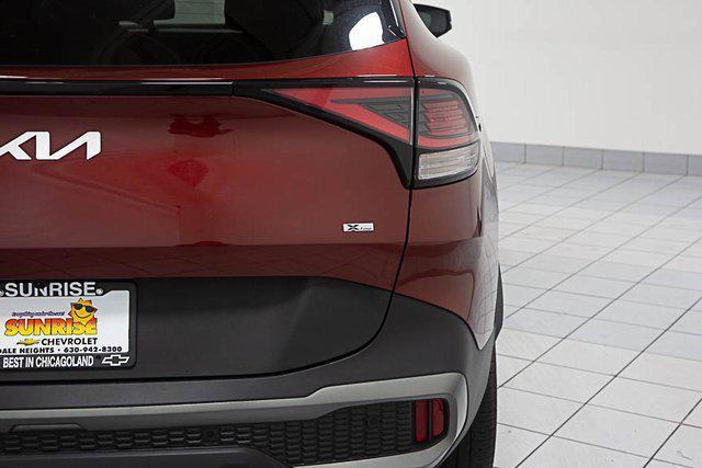 Photo of 2023 Dawning Red Kia Sportage