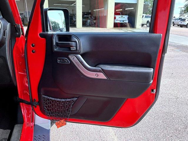 Photo of 2015 Firecracker Red Clear Coat Jeep Wrangler Unlimited