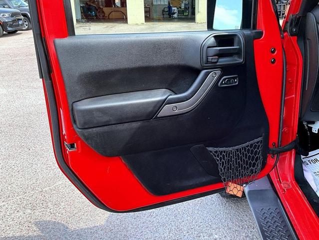 Photo of 2015 Firecracker Red Clear Coat Jeep Wrangler Unlimited
