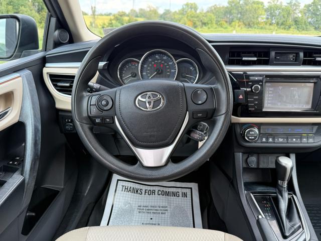 Photo of 2014 Brown Toyota Corolla