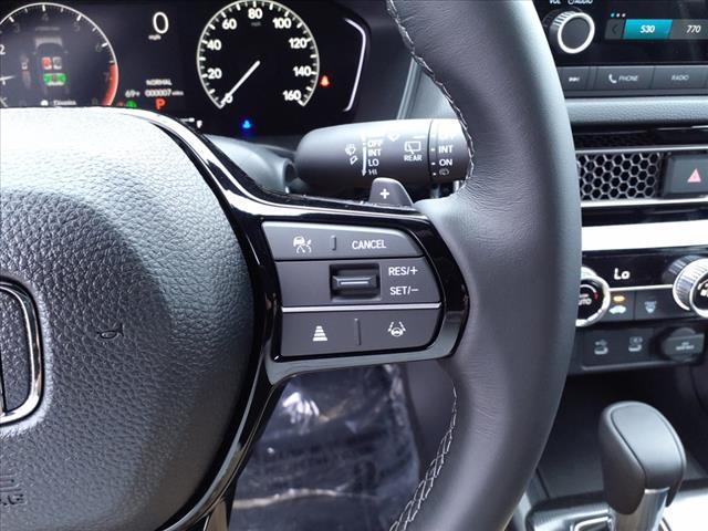 Photo of 2025 Platinum White Honda Civic
