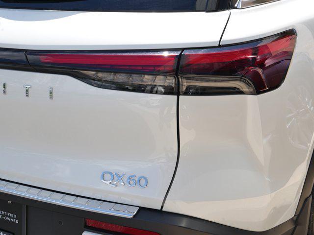 Photo of 2024 Majestic White/Black Obsidian INFINITI QX60