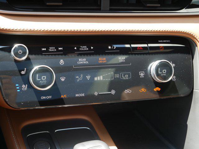 Photo of 2024 Majestic White/Black Obsidian INFINITI QX60