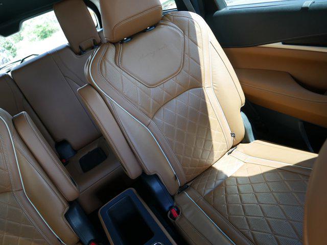 Photo of 2024 Majestic White/Black Obsidian INFINITI QX60