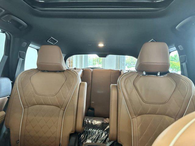 Photo of 2025 Grand Blue/Black Obsidian INFINITI QX60