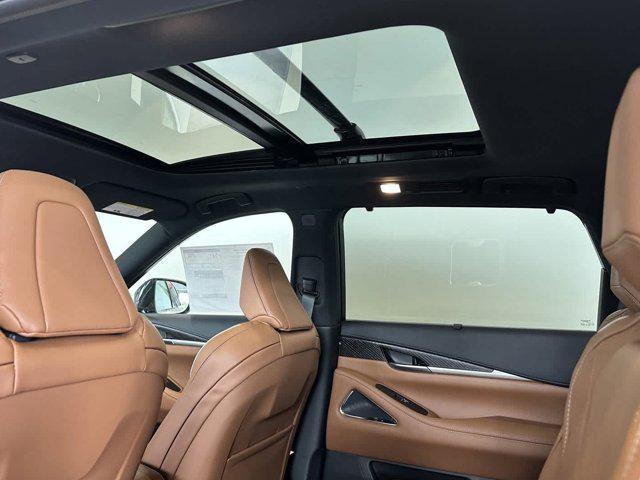 Photo of 2025 Grand Blue/Black Obsidian INFINITI QX60
