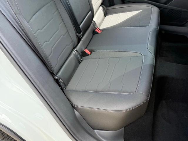Photo of 2025 Pure White W/Black Roof Volkswagen Taos
