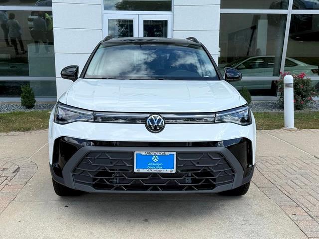 Photo of 2025 Pure White W/Black Roof Volkswagen Taos