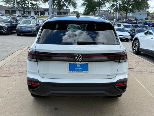 Photo of 2025 Pure White W/Black Roof Volkswagen Taos