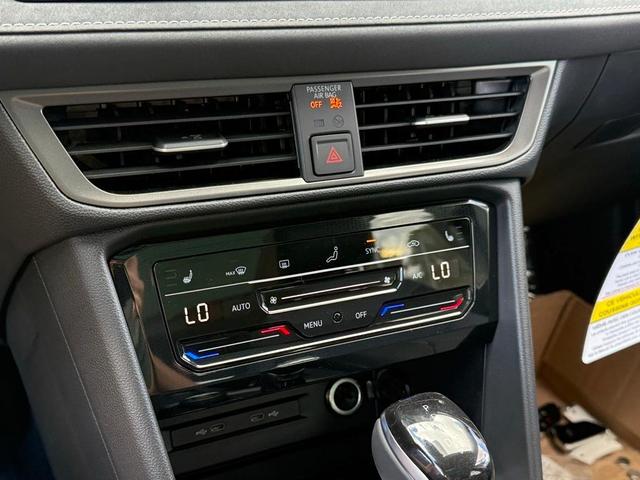 Photo of 2025 Pure White W/Black Roof Volkswagen Taos