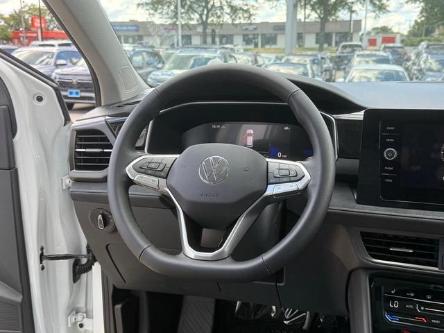 Photo of 2025 Pure White W/Black Roof Volkswagen Taos
