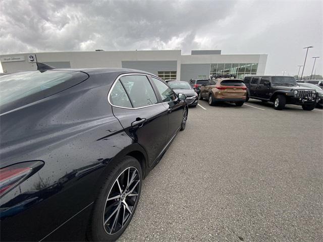 Photo of 2024 Midnight Black Metallic Toyota Camry