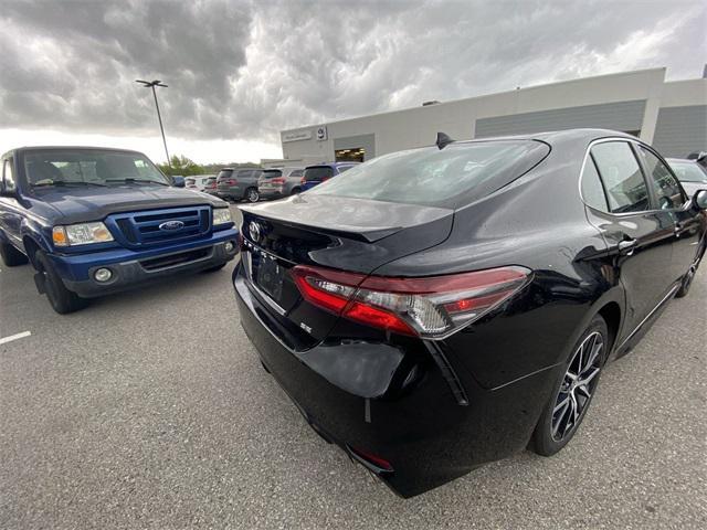 Photo of 2024 Midnight Black Metallic Toyota Camry
