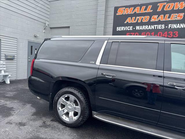 Photo of 2015 Black Chevrolet Suburban