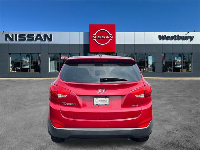 Photo of 2015 Garnet Red Mica Hyundai TUCSON
