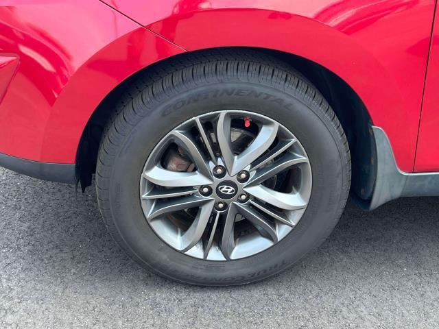 Photo of 2015 Garnet Red Mica Hyundai TUCSON