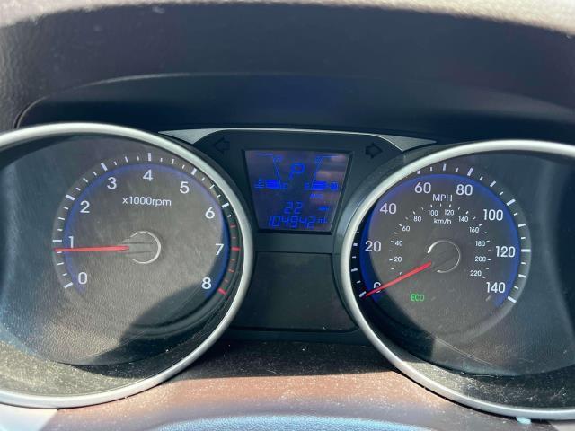 Photo of 2015 Garnet Red Mica Hyundai TUCSON