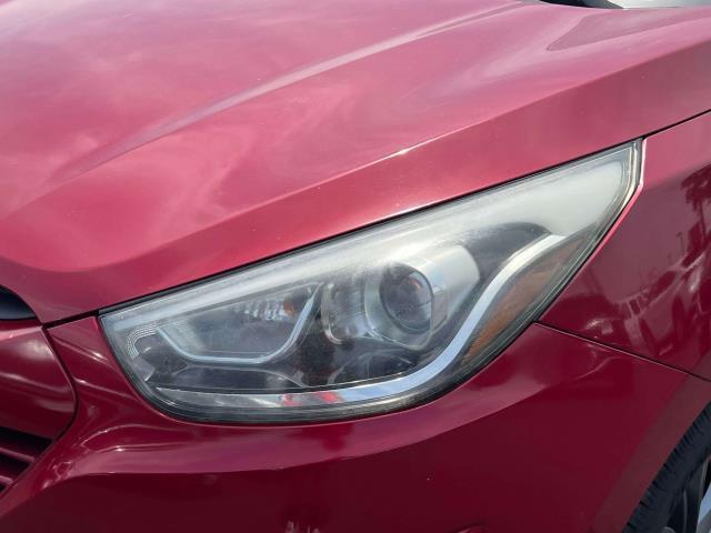 Photo of 2015 Garnet Red Mica Hyundai TUCSON