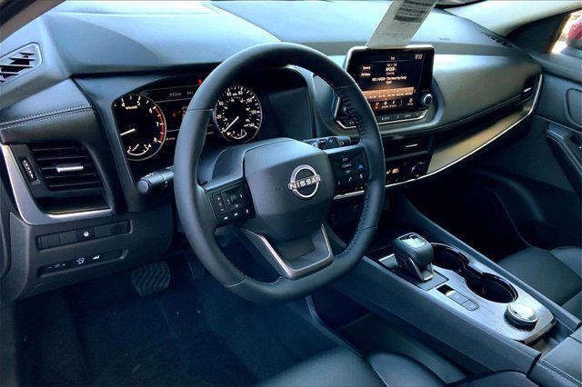 Photo of 2025 Scarlet Ember Tintcoat Nissan Rogue