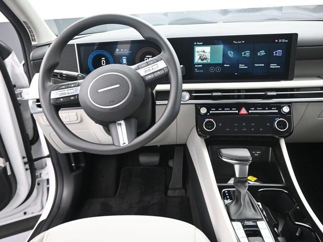 Photo of 2025 Serenity White Pearl Hyundai TUCSON