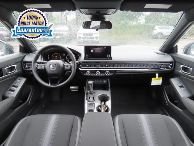 Photo of 2025 Platinum White Pearl Honda Civic Hybrid