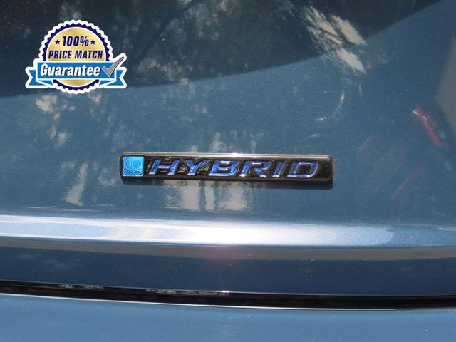 Photo of 2026 Blue Lagoon Pearl Honda Civic Hybrid