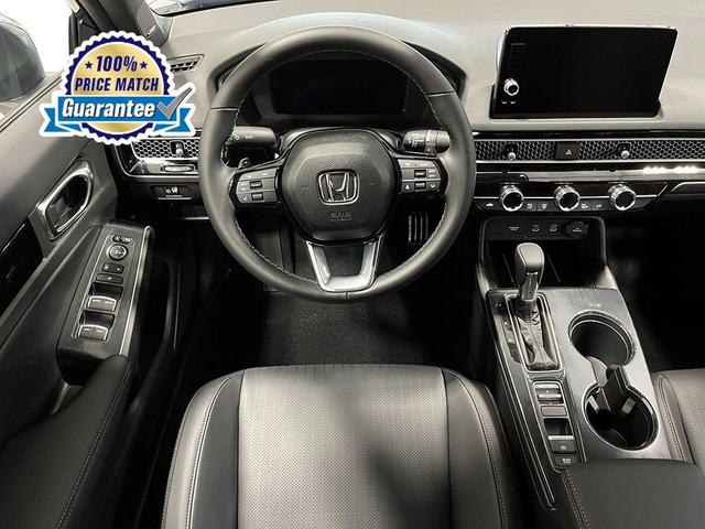 Photo of 2025 Platinum White Pearl Honda Civic Hybrid