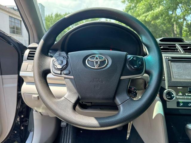 Photo of 2014 Attitude Black Metallic Toyota Camry