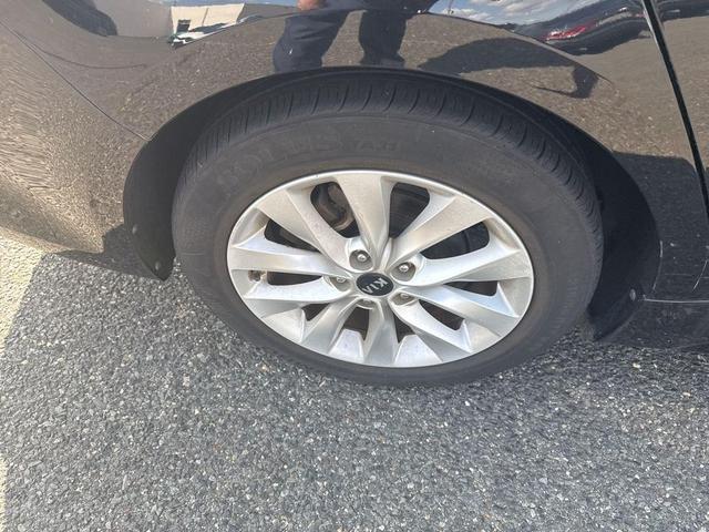 Photo of 2018 Ebony Black Kia Optima