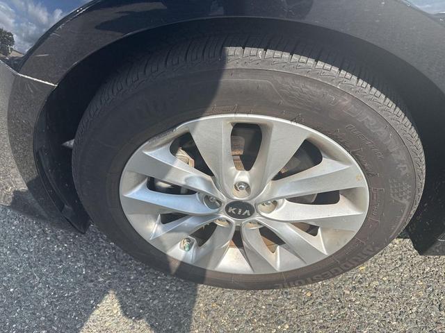 Photo of 2018 Ebony Black Kia Optima