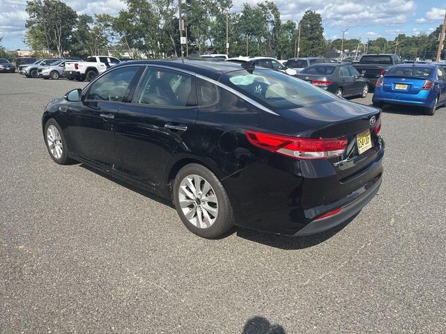 Photo of 2018 Ebony Black Kia Optima
