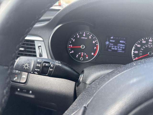 Photo of 2018 Ebony Black Kia Optima