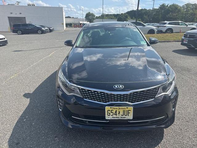 Photo of 2018 Ebony Black Kia Optima