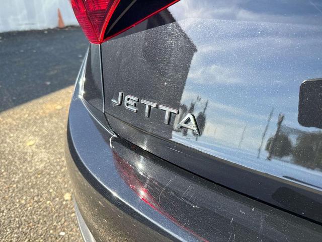 Photo of 2024 Deep Black Pearl Volkswagen Jetta