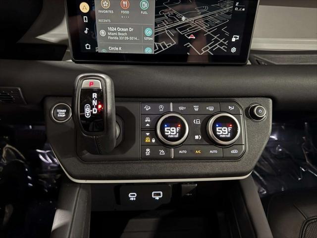 Photo of 2024 Santorini Black Metallic Land Rover Defender