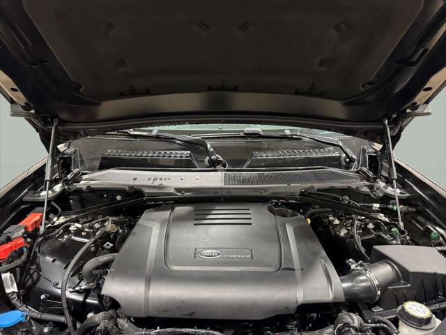 Photo of 2024 Santorini Black Metallic Land Rover Defender