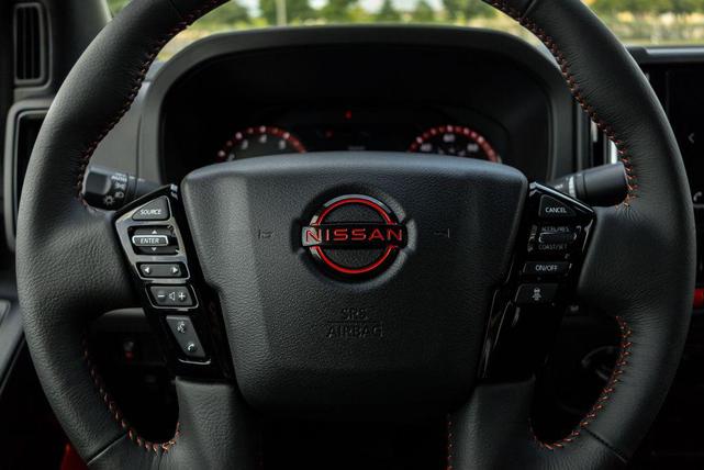 Photo of 2025 Super Black Nissan Frontier