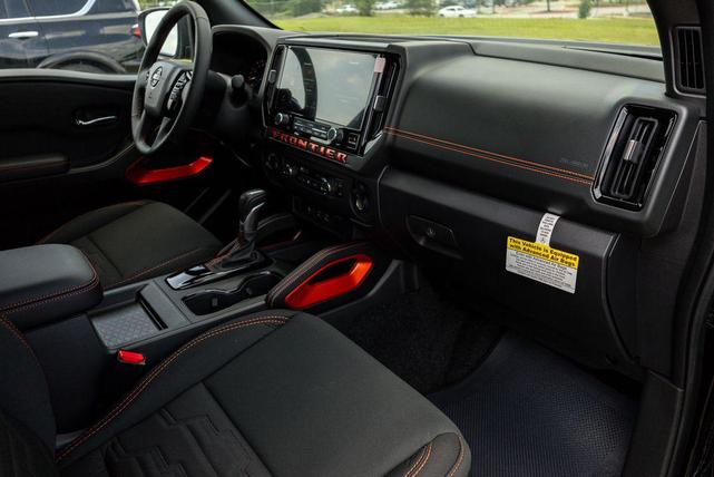 Photo of 2025 Super Black Nissan Frontier