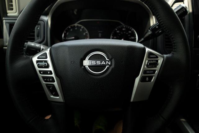 Photo of 2024 Glacier White Nissan Titan XD