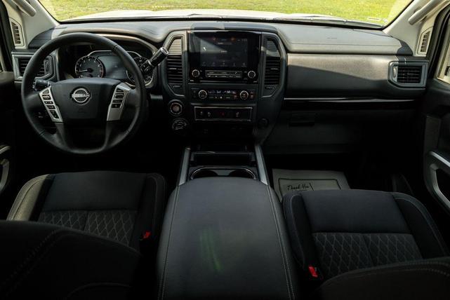 Photo of 2024 Glacier White Nissan Titan XD